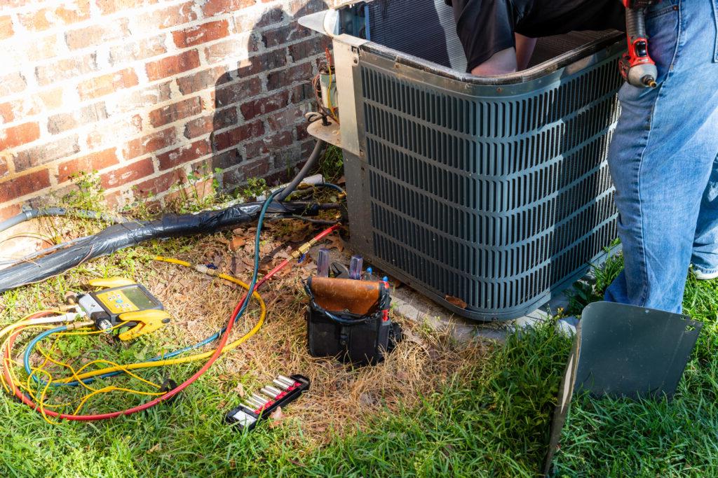 Maintenance on air conditioner unit